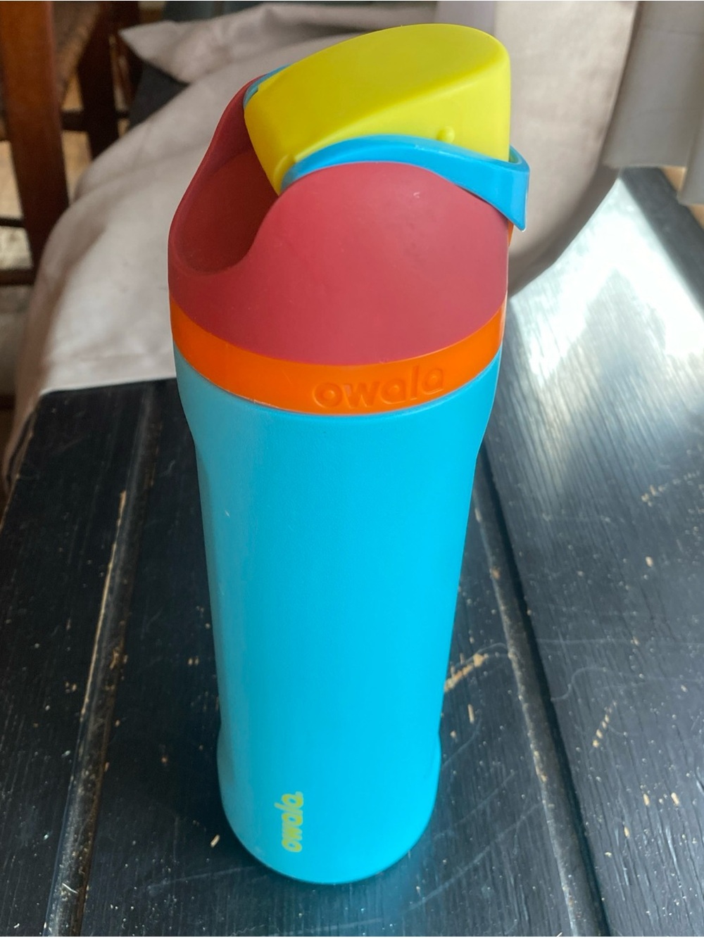 Owala  Water Bottle in Turquoise with Yellow & Red Accent